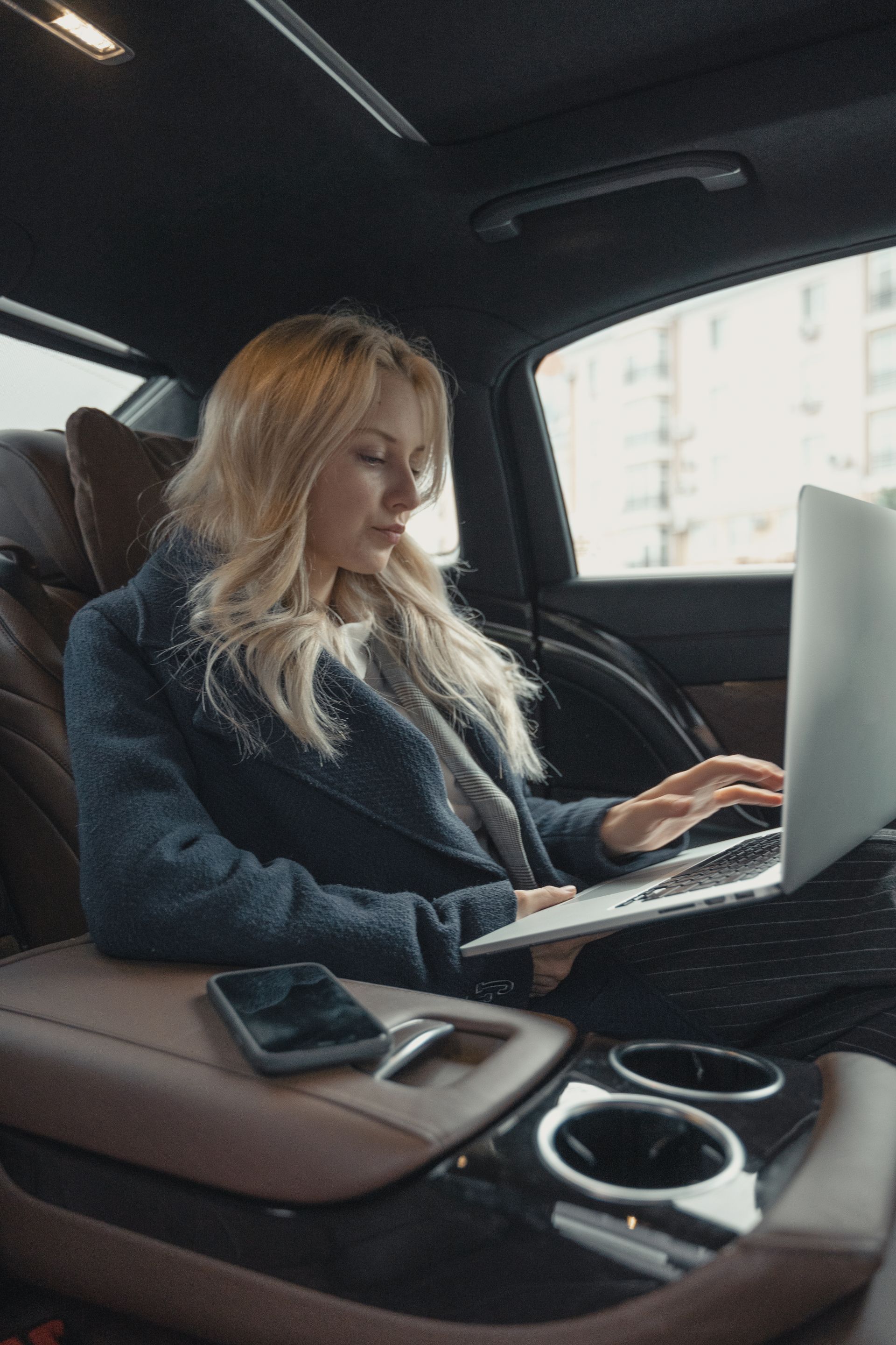 A business traveler working during a comfortable Tourch ride